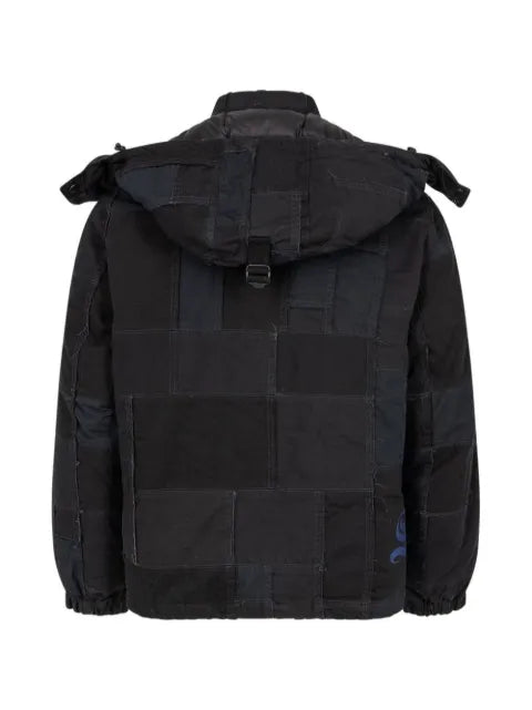 Supreme x Junya Watanabe "Comme Des Garcons" patchwork puffy jacket
