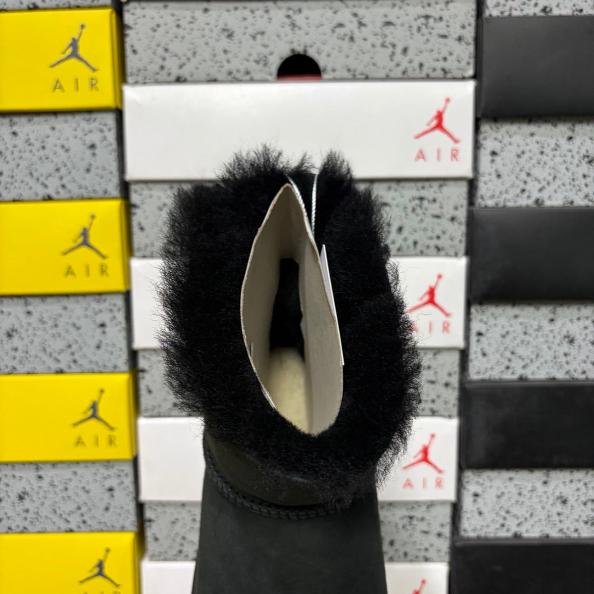 UGG Mini Bailey Bow Ankle Boot – Suede Boot with Tonal Black Shearling Lining, Black Satin Bow & All-Black Lug Sole in Black