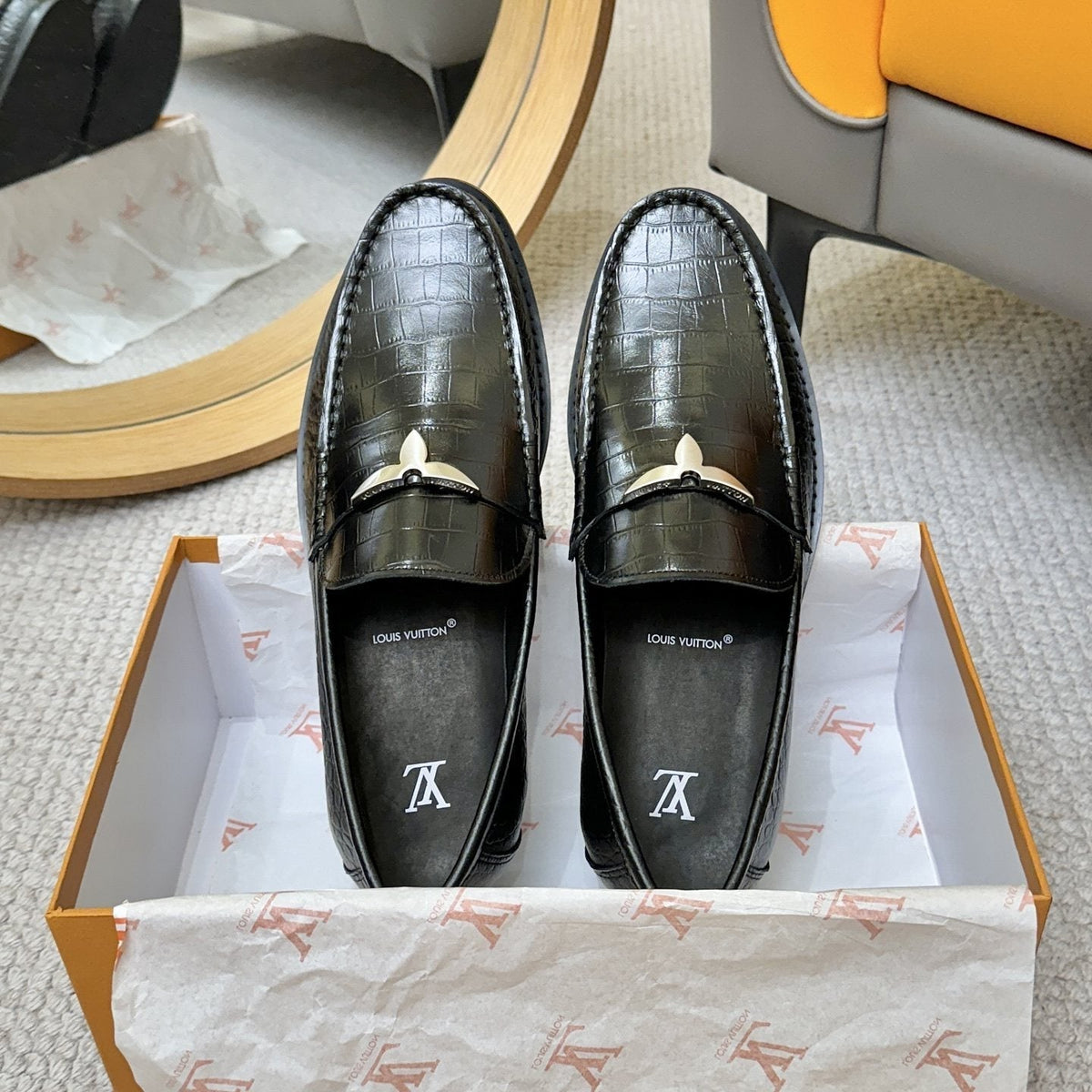 Louis Vuitton Men's Black Embossed Leather Loafers