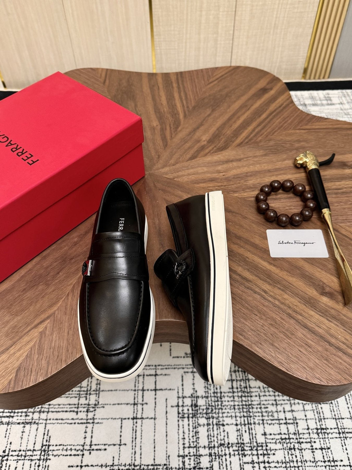 Salvatore Ferragamo Black Loafers with White Soles