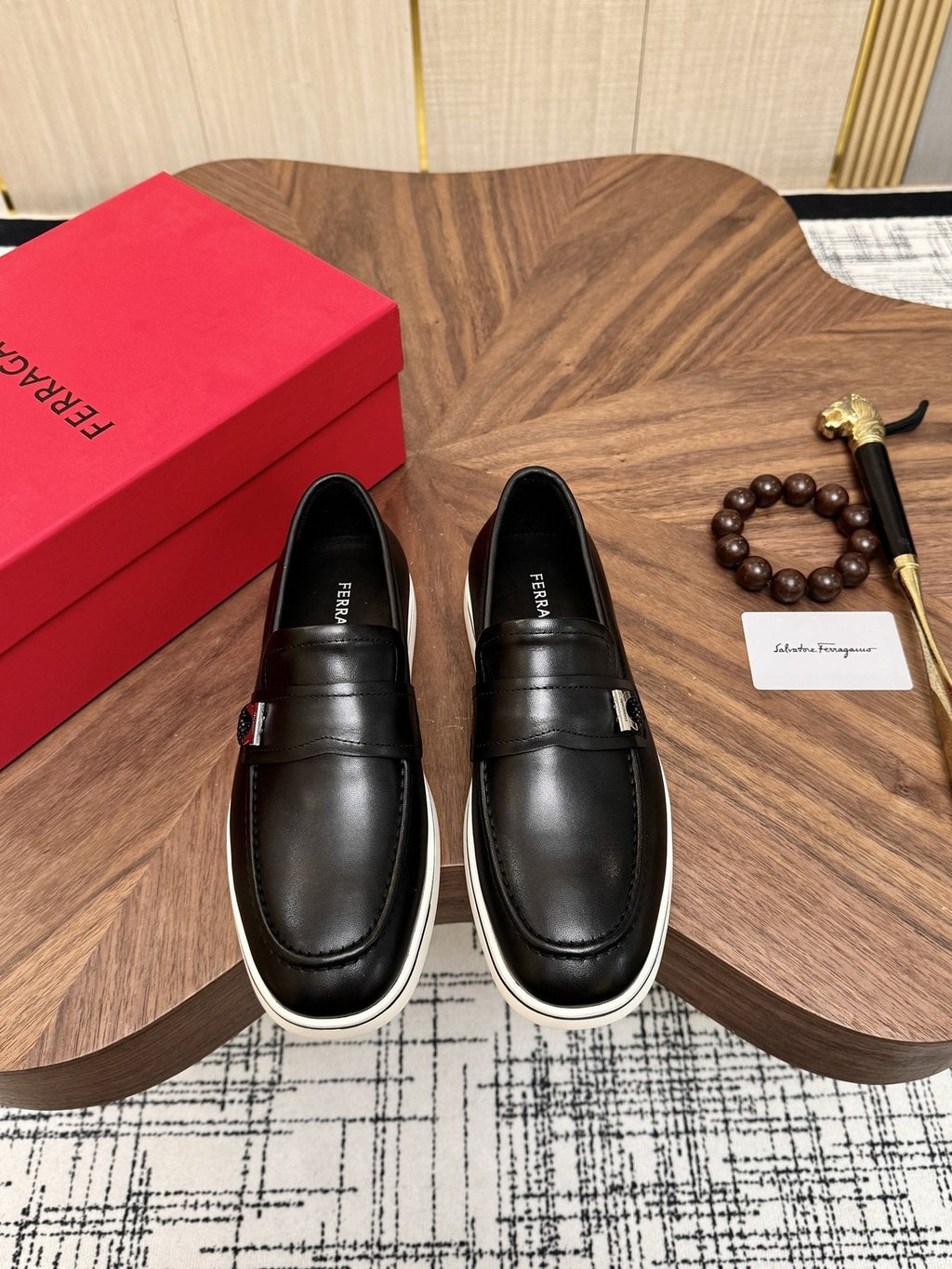 Salvatore Ferragamo Black Loafers with White Soles