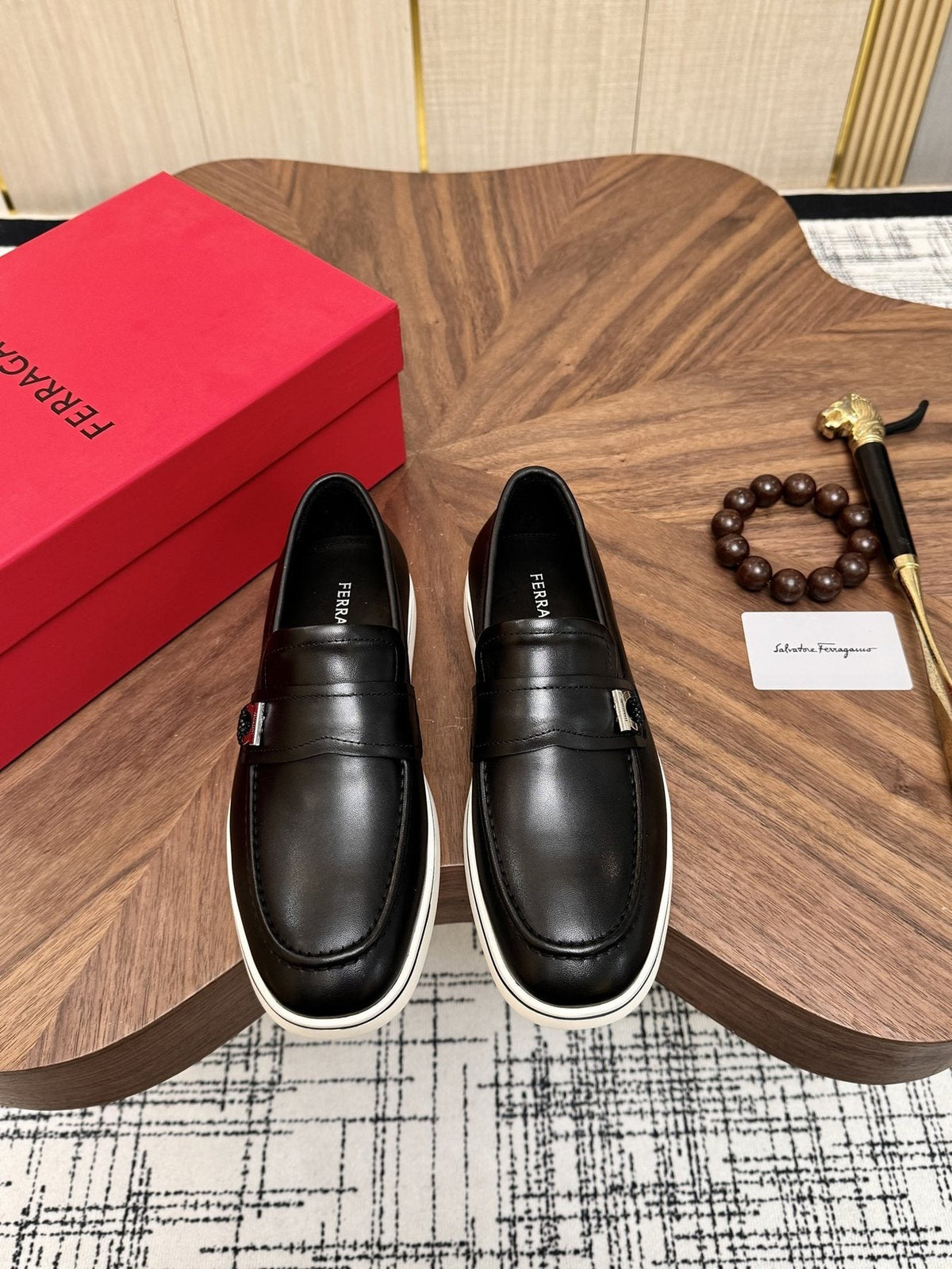 Salvatore Ferragamo Black Loafers with White Soles