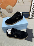 Prada Triangle Logo Low-Top Sneakers - Lug Sole