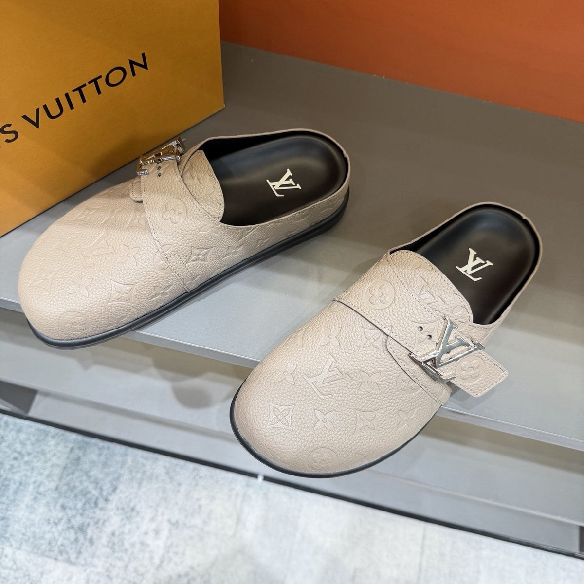 Louis Vuitton Embossed Buckle Slide Sandals